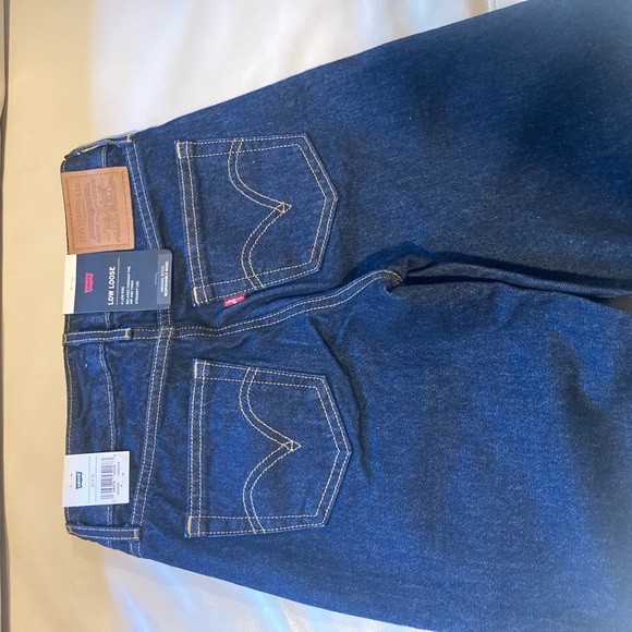 Levi’s Low Loose NWT dark wash cotton Blue Jeans size 24/32 - Picture 3 of 8